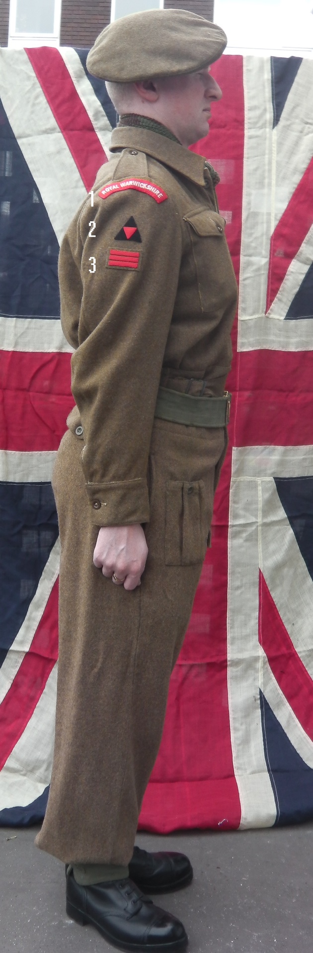 Re-enactor wearing battledress, showing right-arm insignia
